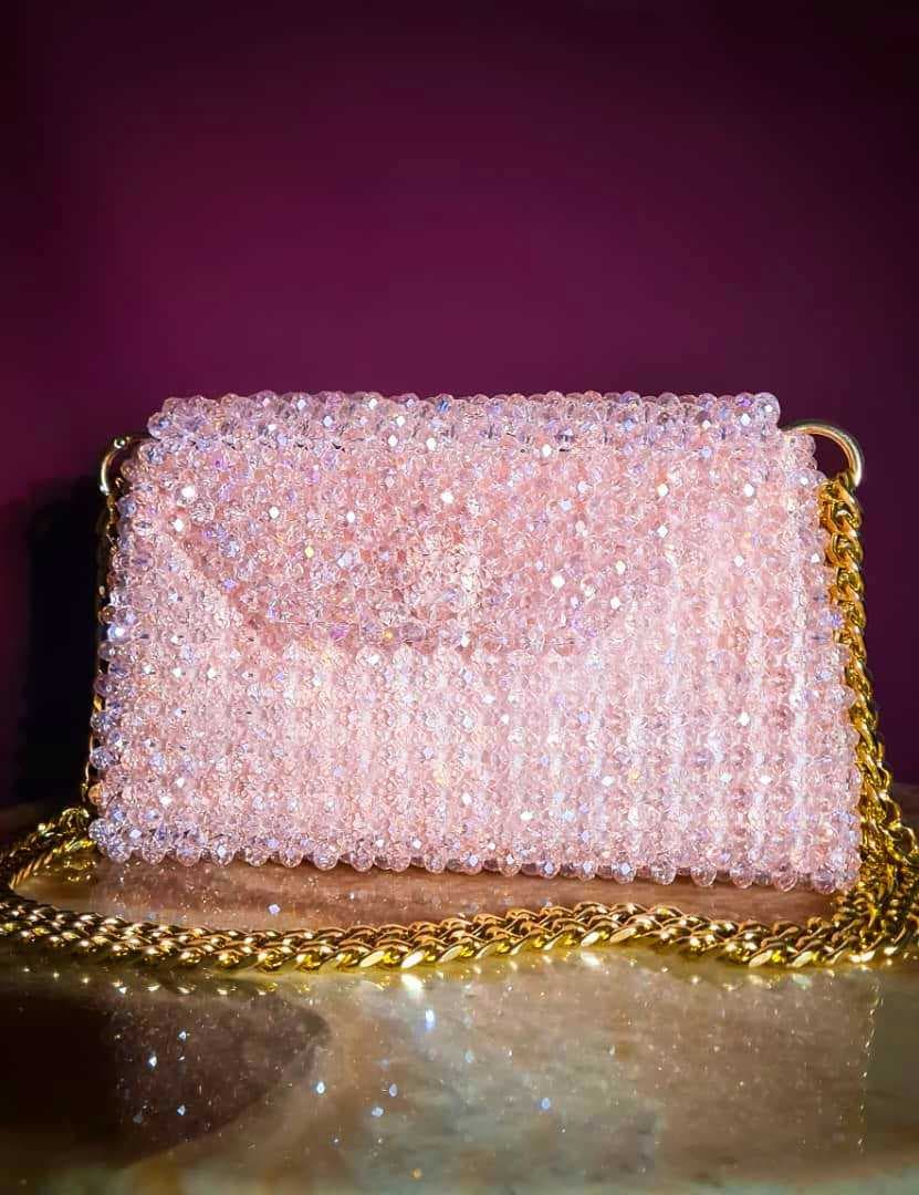 A chic, handcrafted handbag made of sparkling Glass Crystal beads Pink
