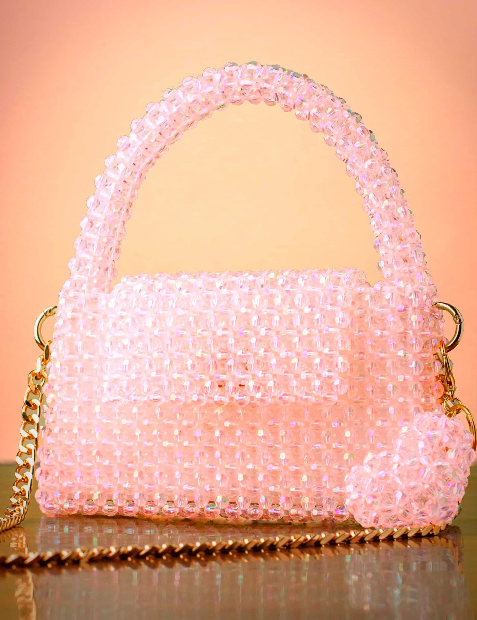 a luxurious fully handcrafted handbag made from acrylic crystal Pink