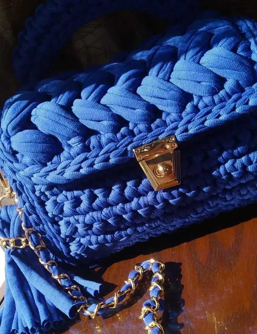 A stylish handmade crochet handbag Blue