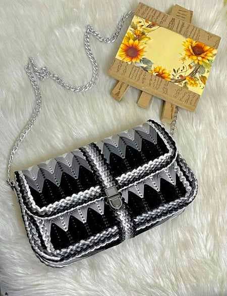 a stylish small bag made from colorful satin black