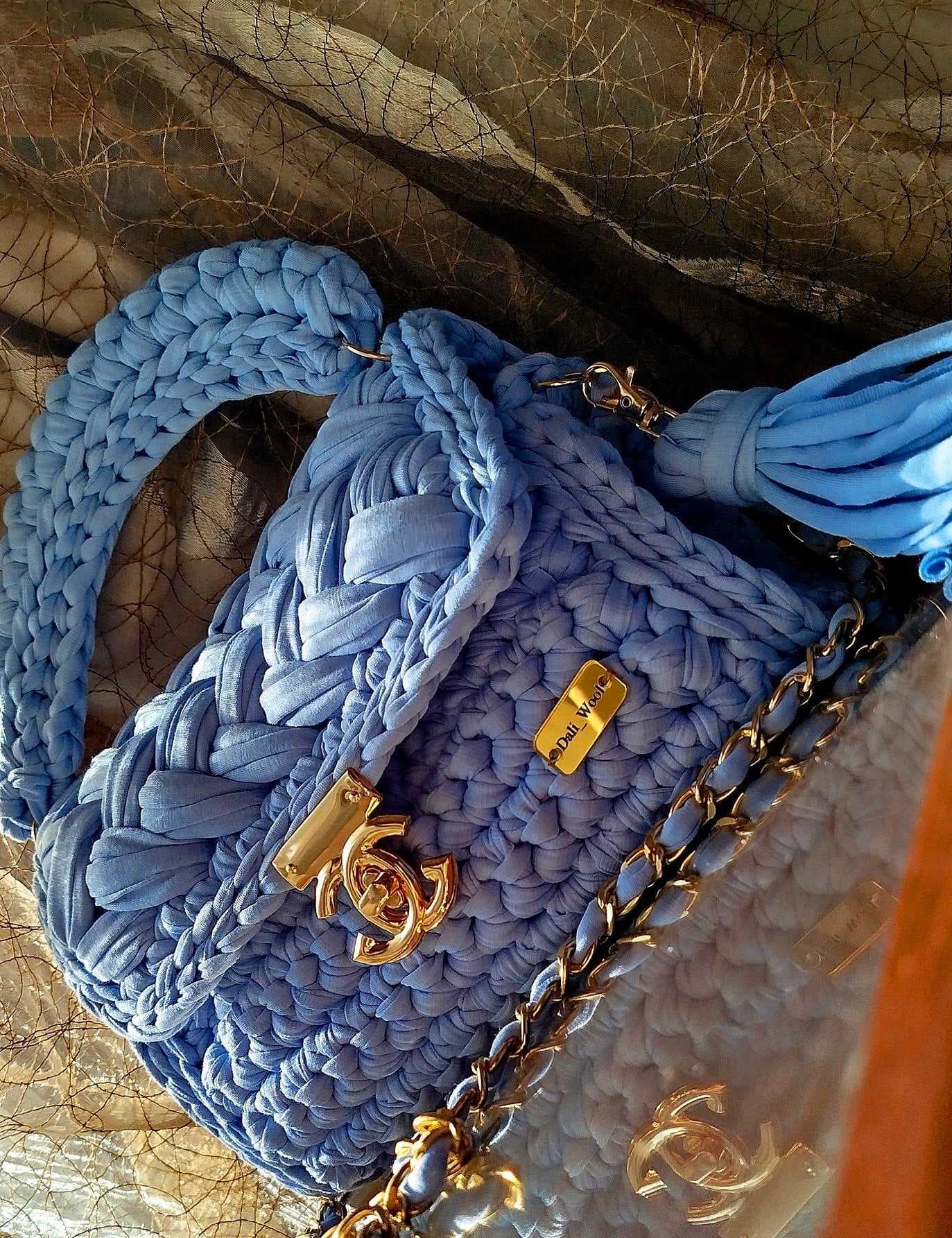 A stylish handmade crochet handbag light Blue