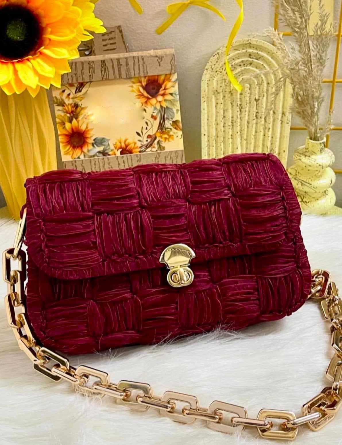 a stylish and modern handbag burgundy color